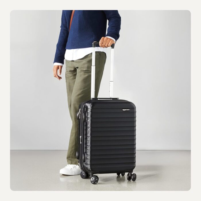 Amazon Basics 21-Inch Hardside Carry-On Luggage, Hardshell Suitcase With Wheels, Expandable For Up to 25% More Space, With Scratch-Resistant Surface, Four Multi-directional Wheels, Black - Image 3
