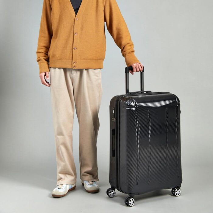 Amazon Basics 30-Inch Hardside Checked Luggage With TSA Lock, Hardshell Suitcase With Wheels, Expandable For Up to 12.5% More Space, With Scratch-Resistant Surface, 8 Multi-directional Wheels, Black - Image 6